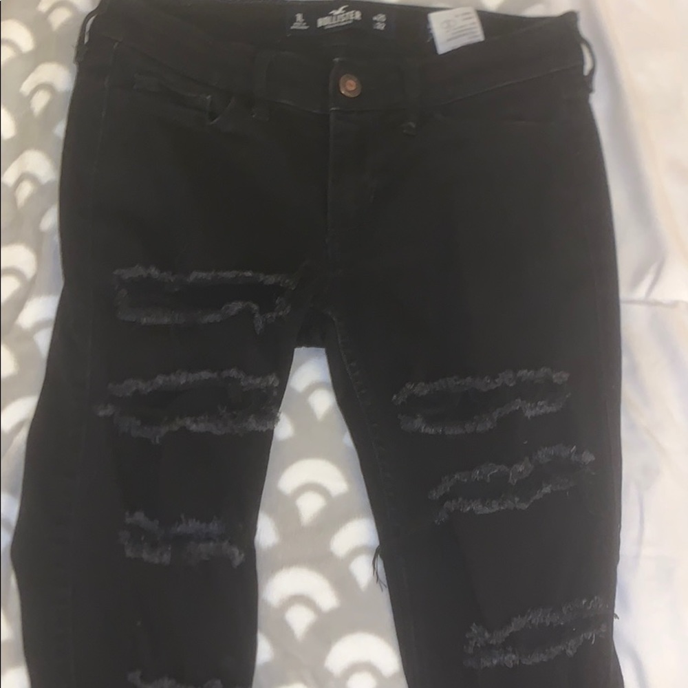 Black distressed hollister jeans.